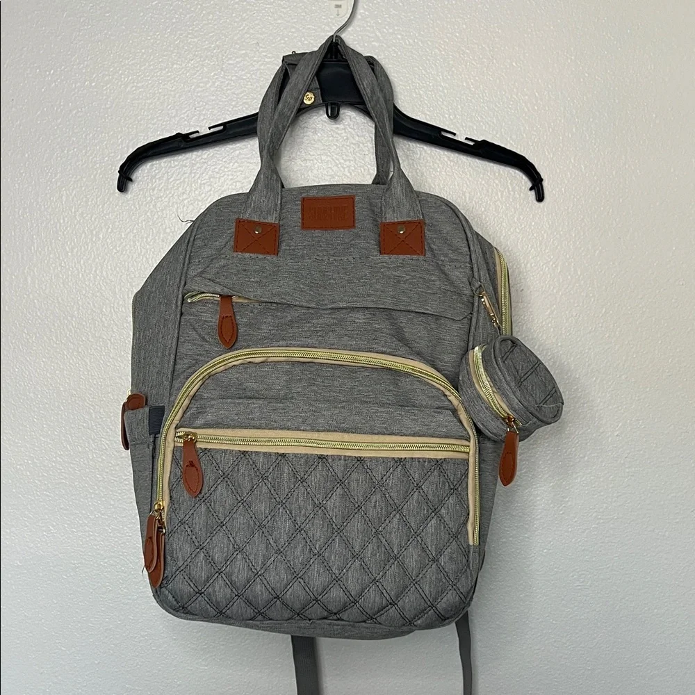 Gray Quilted Backpack with Brown Accents